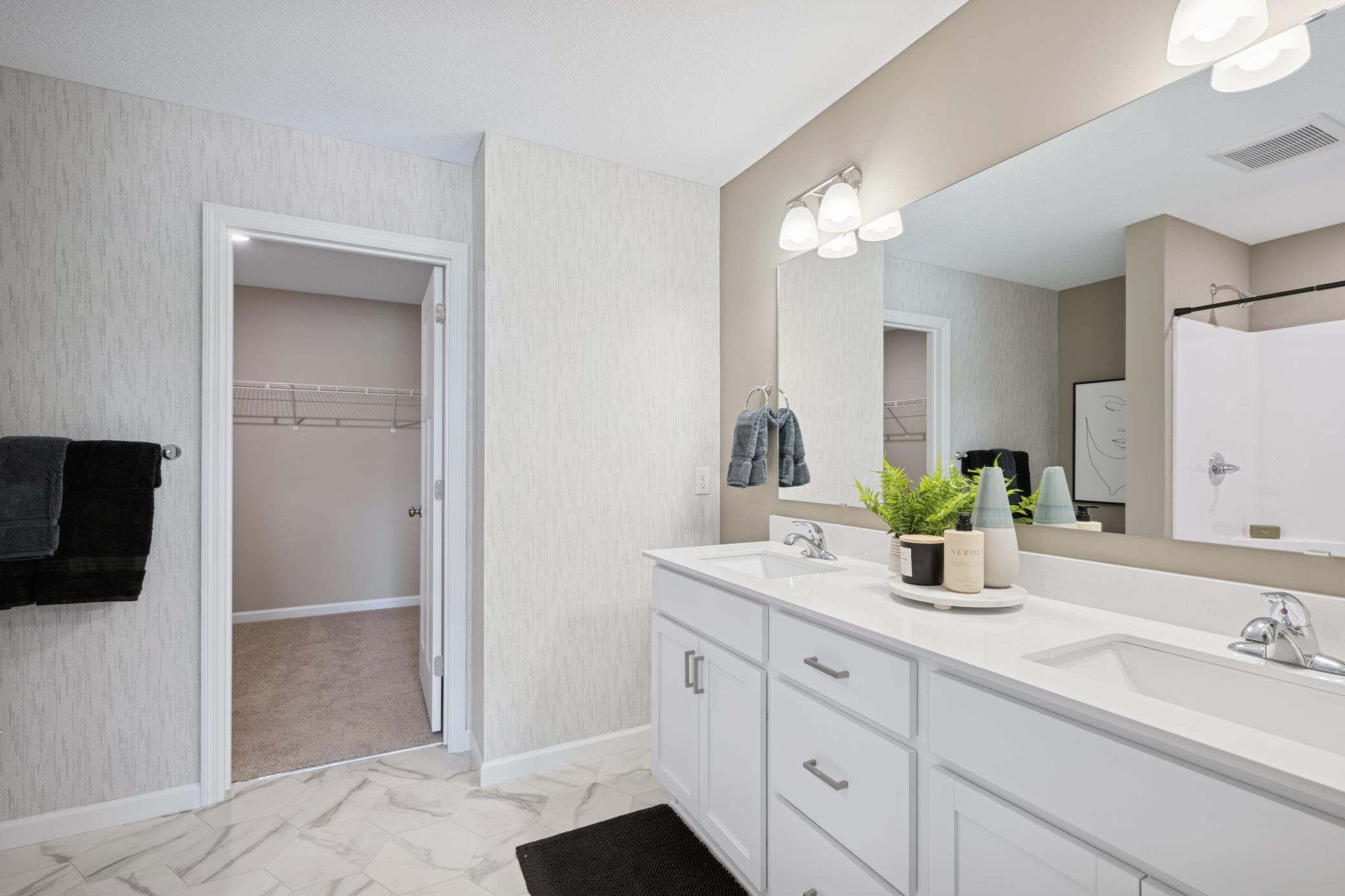 Primary bathroom - photo of a staged model home of the same floorplan
