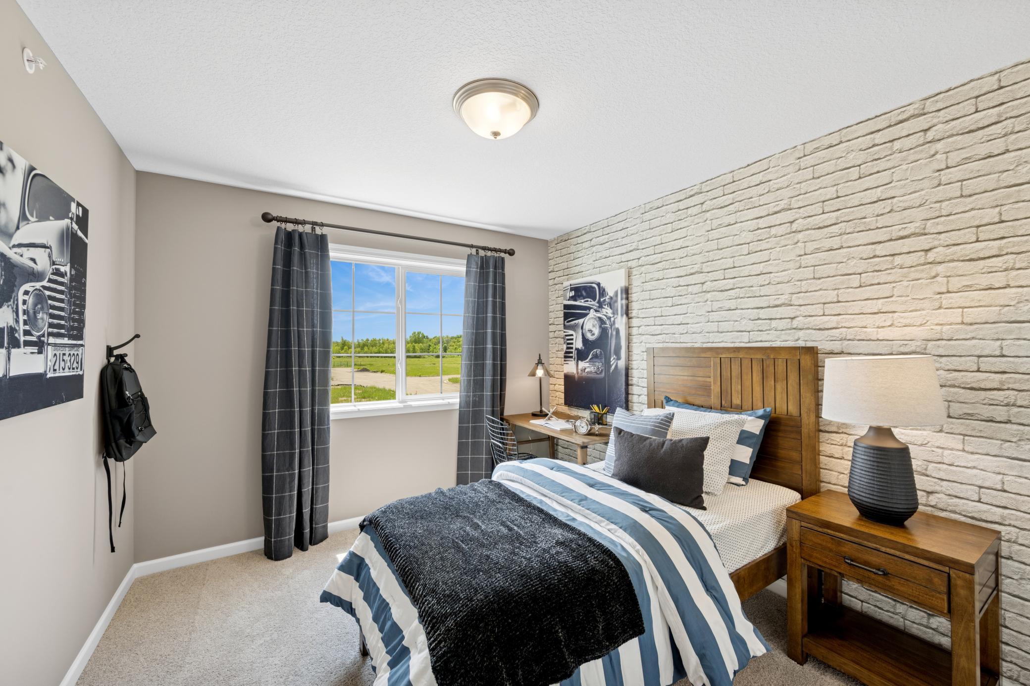 Bedroom - photo of a staged model home of the same floorplan