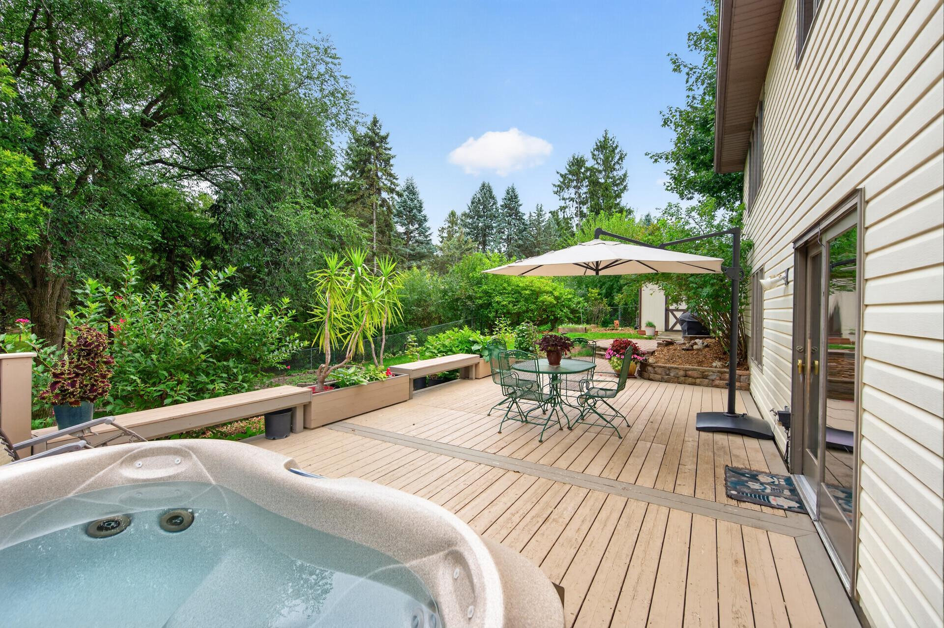 Welcome Home! Back Deck Features tons of space for entertaining and an inviting Hot Tub!