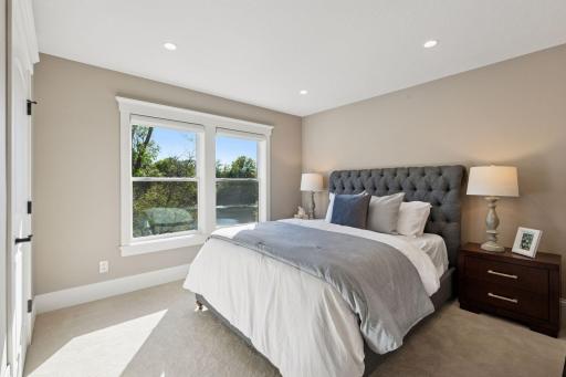 Third bedroom on the upper level with ensuite bath