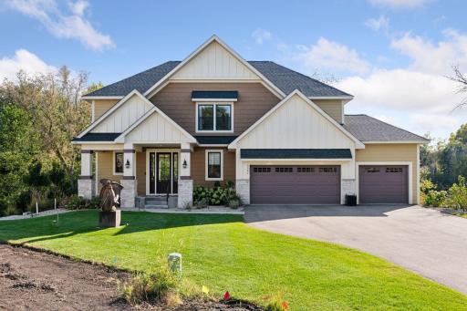 Property welcomes you with an inviting front porch.
