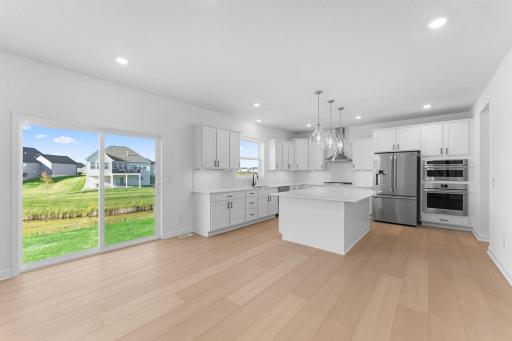 (All the following photos are of a similar home, actual finishes may vary.) The kitchen is equally stylish and practical with sleek cabinetry, high-end finishes and all-new stainless steel appliances.