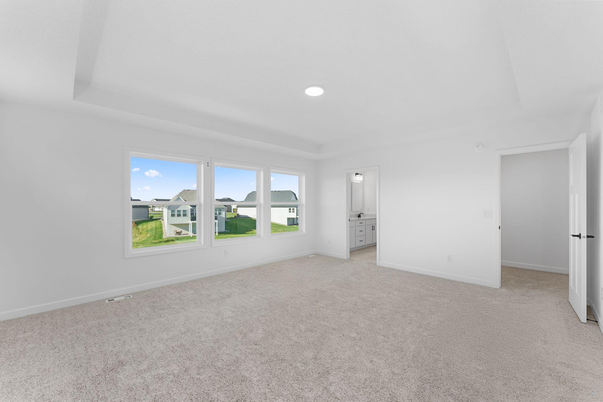 Nestled into a private corner on the second floor, the owner’s suite is a restful retreat complete with a spacious bedroom, en-suite bathroom and generous walk-in closet.