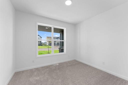 A convenient office can be found near the entry, allowing residents to complete important tasks throughout the day.