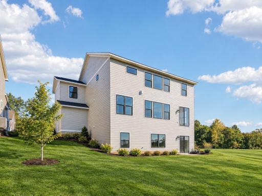 Rear Walkout Elevation *Image may include AI-generated or digitally enhanced landscaping for illustrative purposes only.