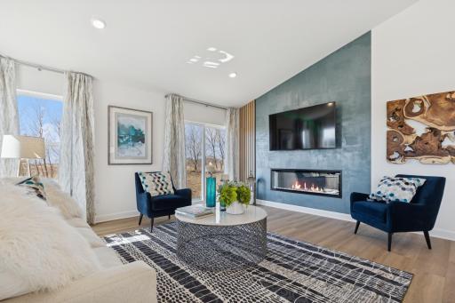 (Photo of decorated model, actual home's finishes will vary)The great room is cozy and contemporary.