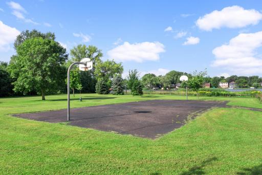 Outdoor basketball courts offer additional recreation just a short walk from the community.