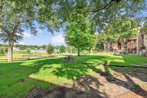 Enjoy direct access to open green space leading toward Twin Lake and nearby recreational amenities.