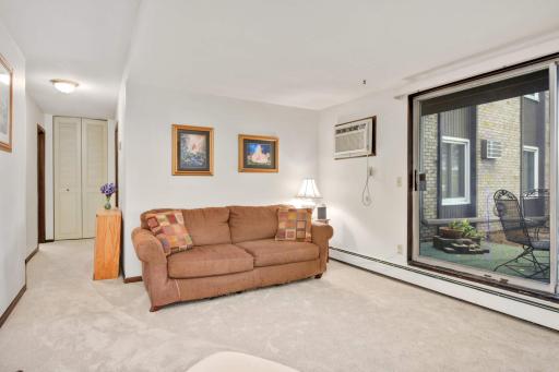 Another view of the generous living room, offering flexible space for relaxing, entertaining, or everyday living.