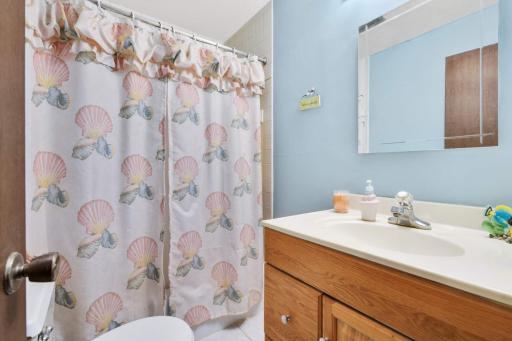 Clean, well-maintained full bathroom with updated vanity and a practical layout designed for everyday living.