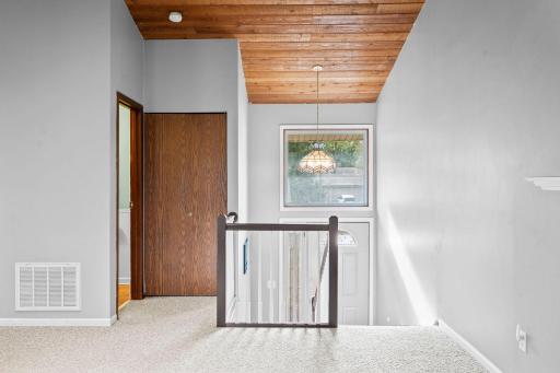 Split entry opens into vaulted living room