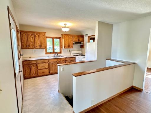 Just off the back entry door, the kitchen here is efficient