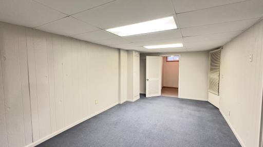 In the lower level, a spacious family room