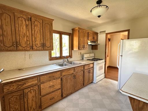 Clean and bright, the kitchen is functional