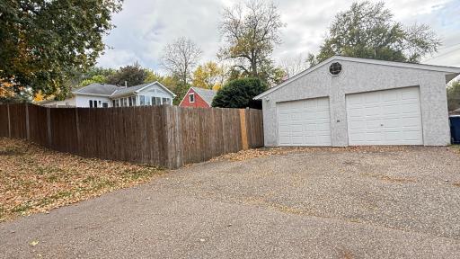 Huge detached garage is situated on the alley. Big enough for 2 cars, equipment and a workshop!