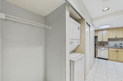 Hall closet with stackable washer and dryer