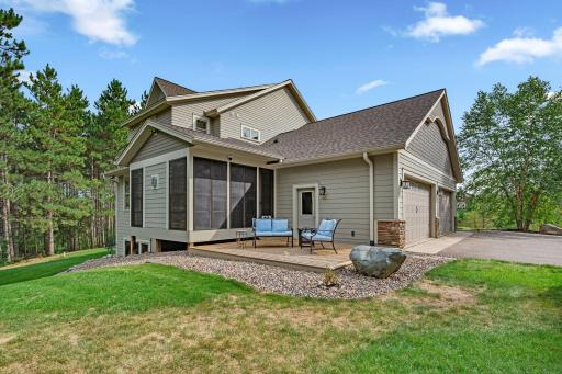 An epic back deck and screened porch for afternoon cocktails or entertaining.