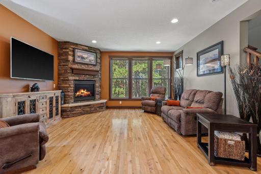 Cozy up in this large living room with gorgeous windows.