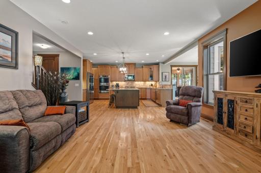 The perfect flow from the kitchen to the living room and dining room, with a massive center island for gathering or production!