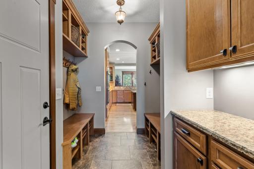 The perfect garage entryway does exist! So much storage and so thoughtfully laid out.