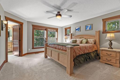 The primary suite is massive and contains a luxury bath, massive walk through closet, and access to the laundry room.