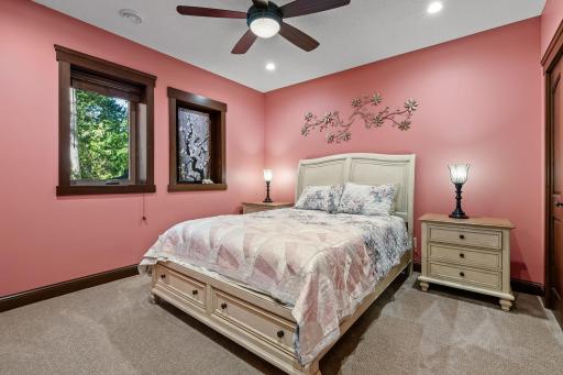 4th bedroom in the lower level is perfect for guests and has a full bath across the hall.