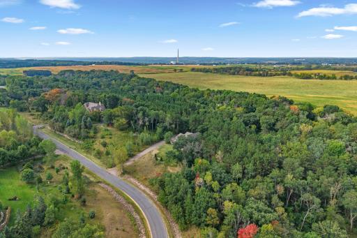 The 12 acre property spans the traditional lot, and has a large strip of woods behind each of the neighbors to the south of the property.