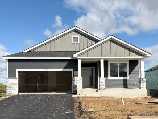 Welcome to 5178 Long Pointe Bay! (Photo is of the actual home in progress.)