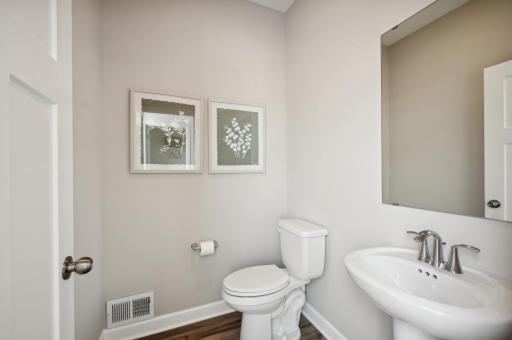 (Photo of model home, finishes will vary) Main level powder bath.