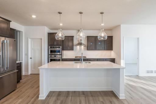 (All the following photos are of a similar home, actual finishes may vary.)