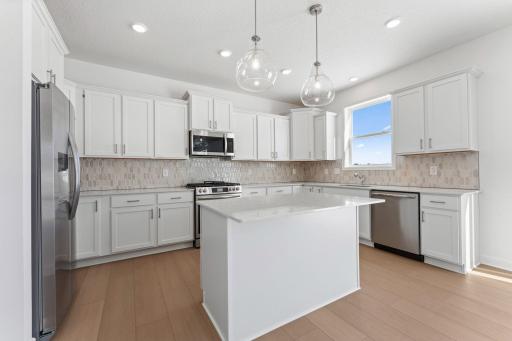 (Photo of a similar home, actual homes finishes will vary)
