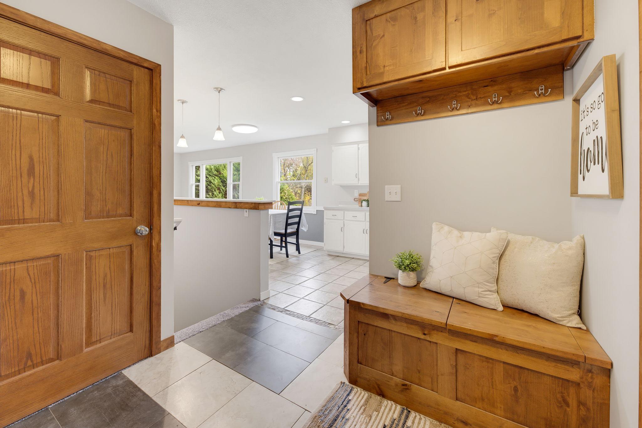 Welcoming Foyer with Bench Storage & Walk-in Pantry or Closet