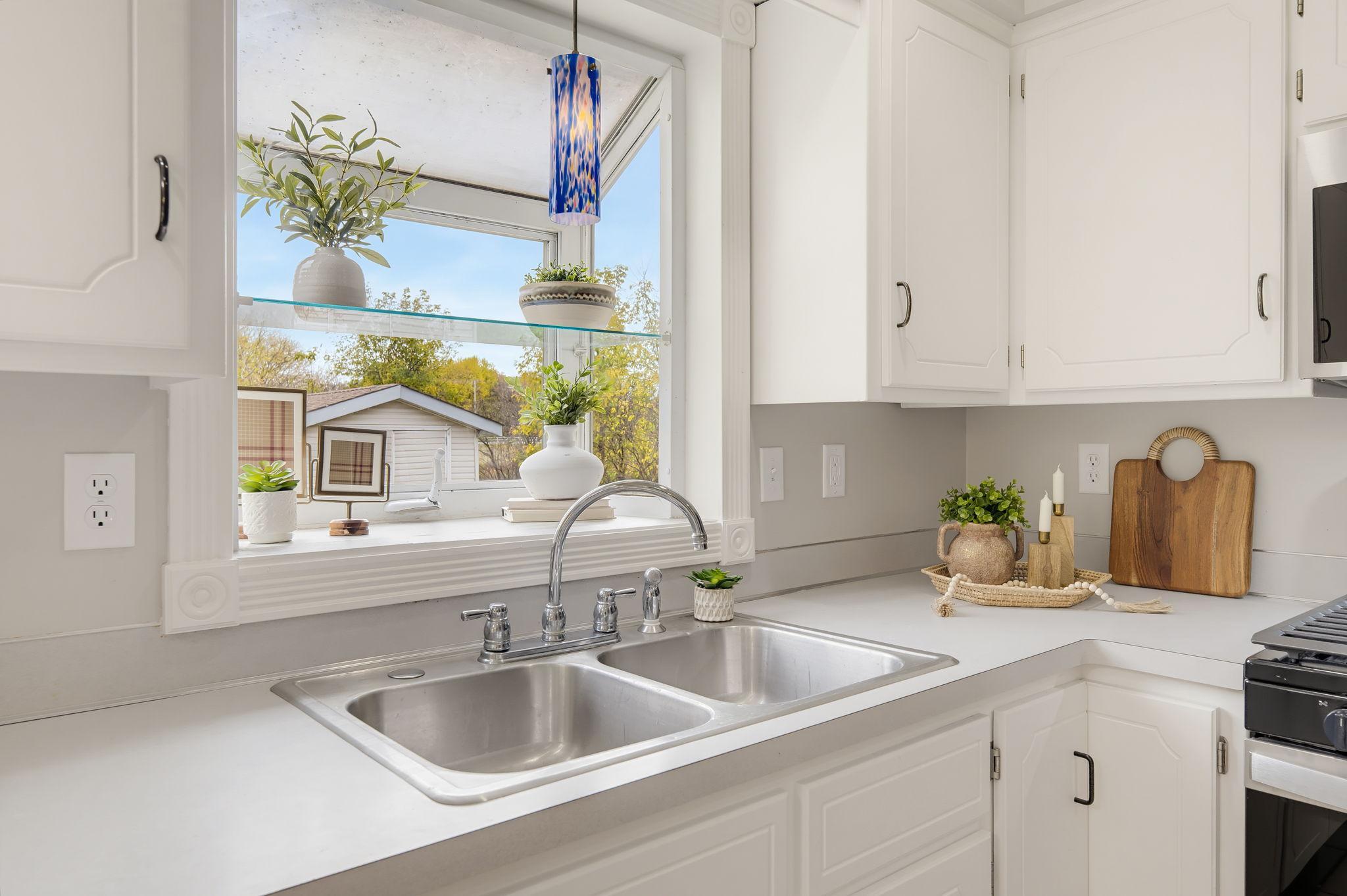 Kitchen Sink Overlooks the Backyard for Breathtaking Views