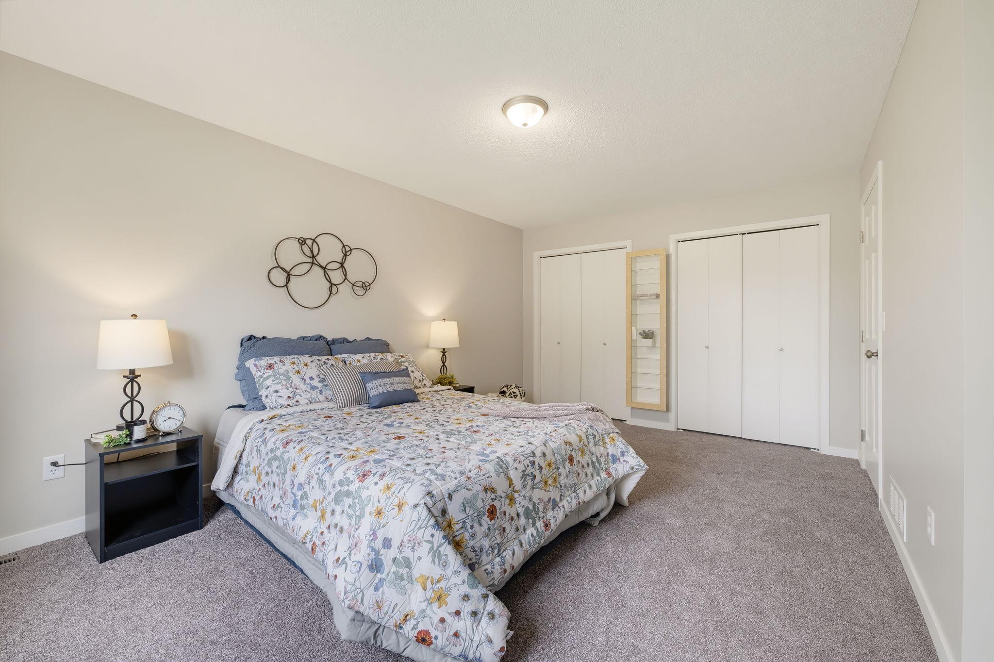 Primary Bedroom on the Main Level with New Carpet, Fresh Paint & Double Closets