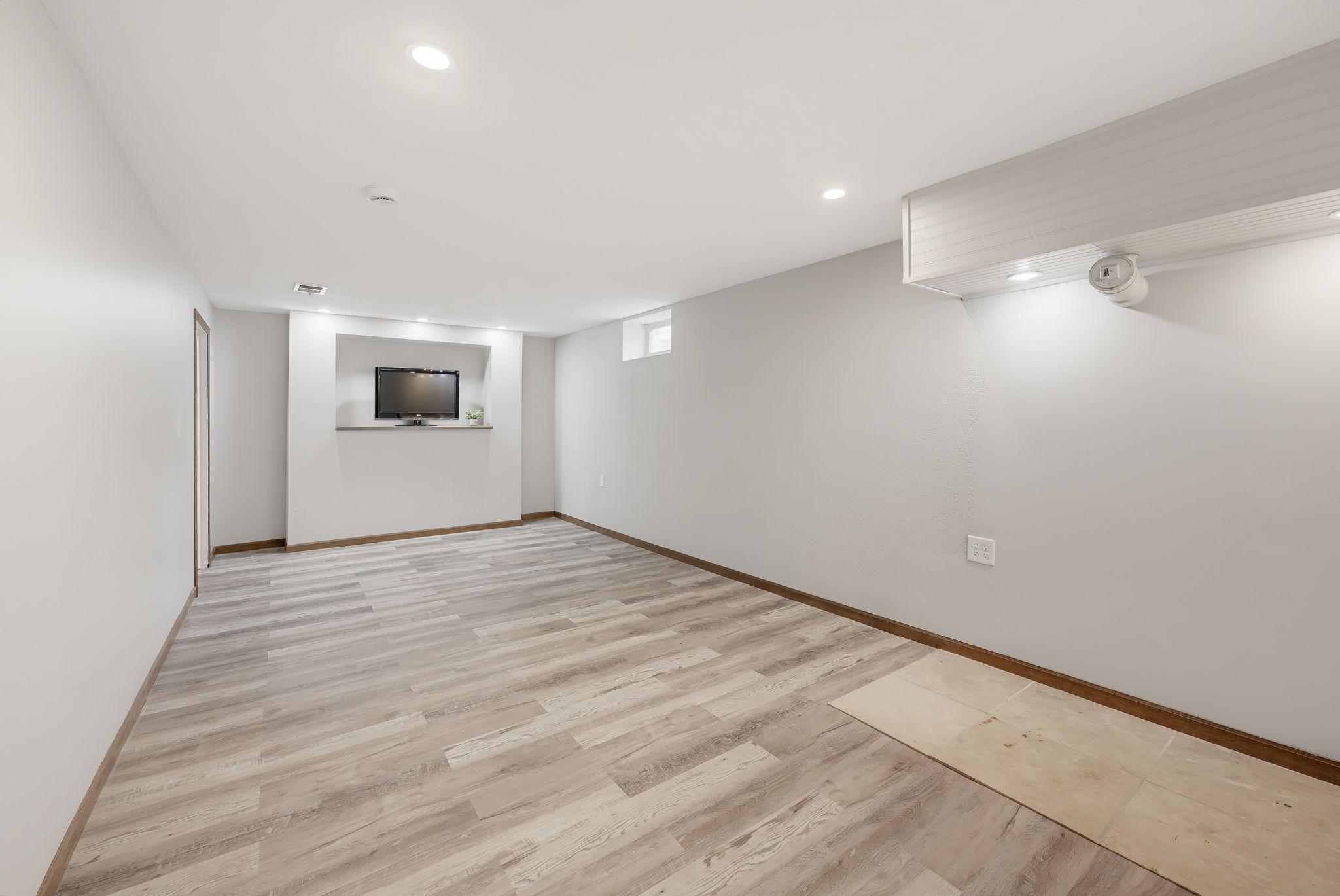 Lower Level Family Room Makes for a Great Movie Spot