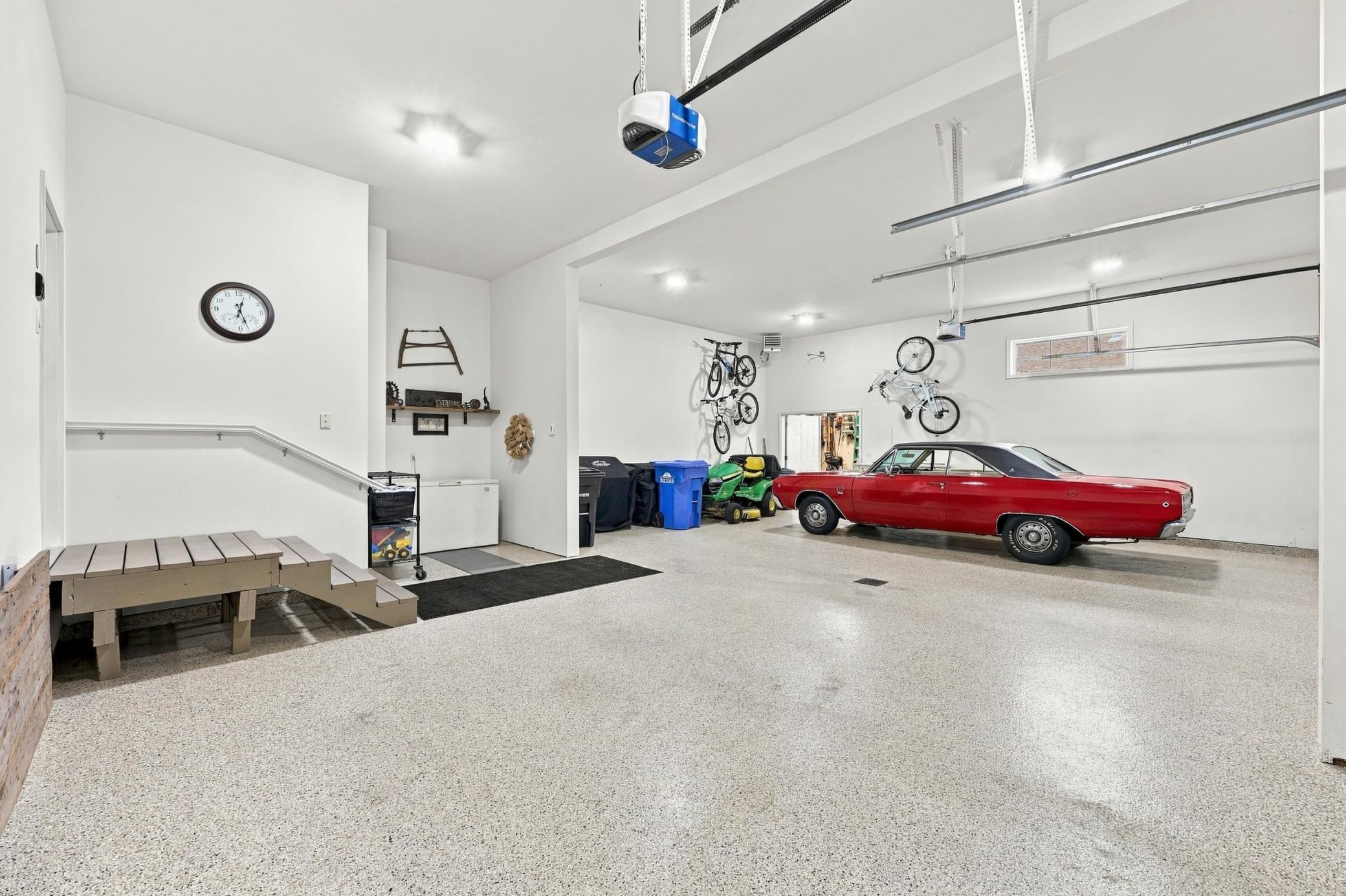XL 1,184 sf finished garage offers ample space for 3 vehicles including a full sized pickup as well as additional storage space. Expoxy flooring done in 2025.