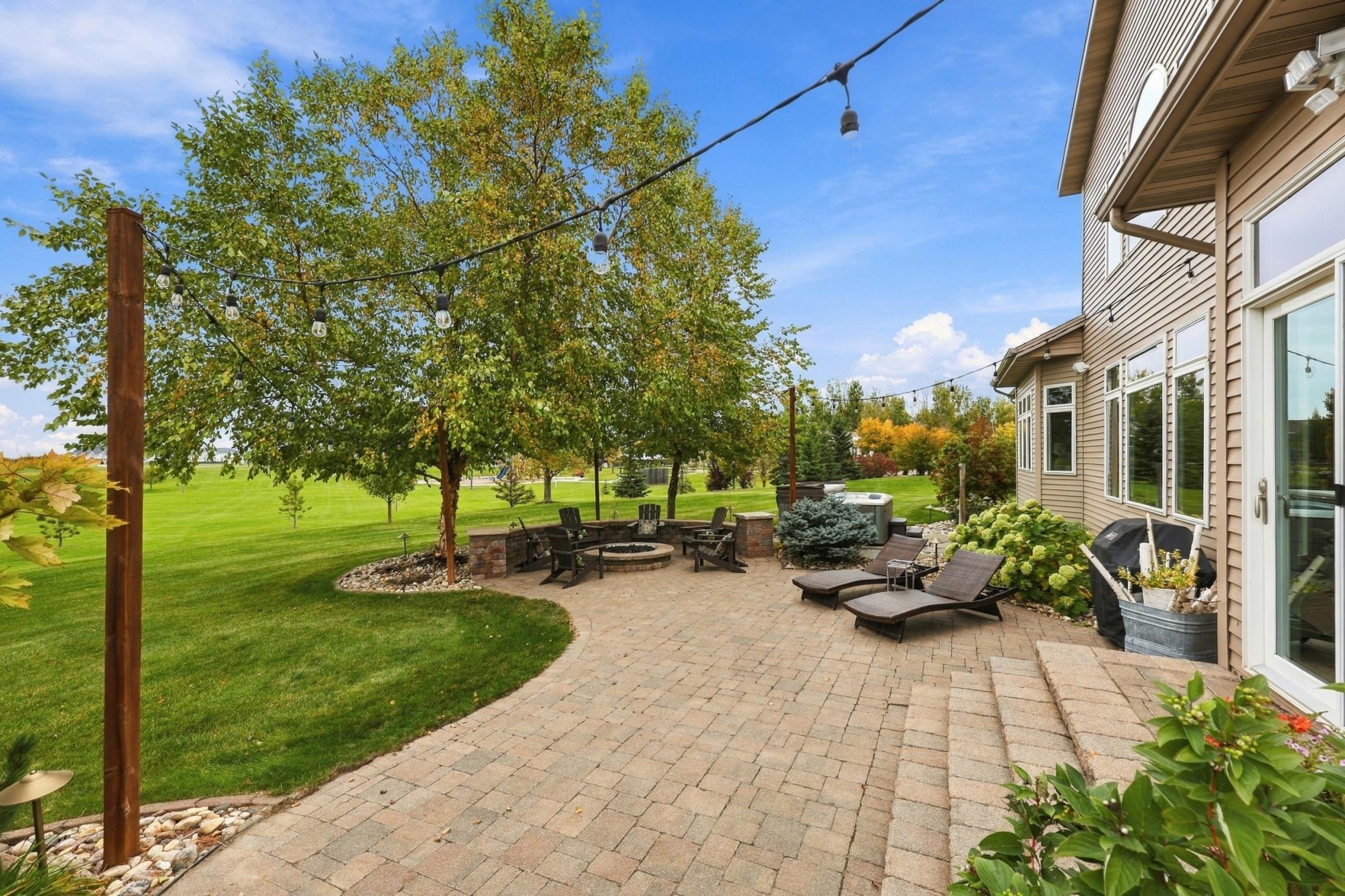 Patio, landscaping and exterior lighting designed by Opp Construction.