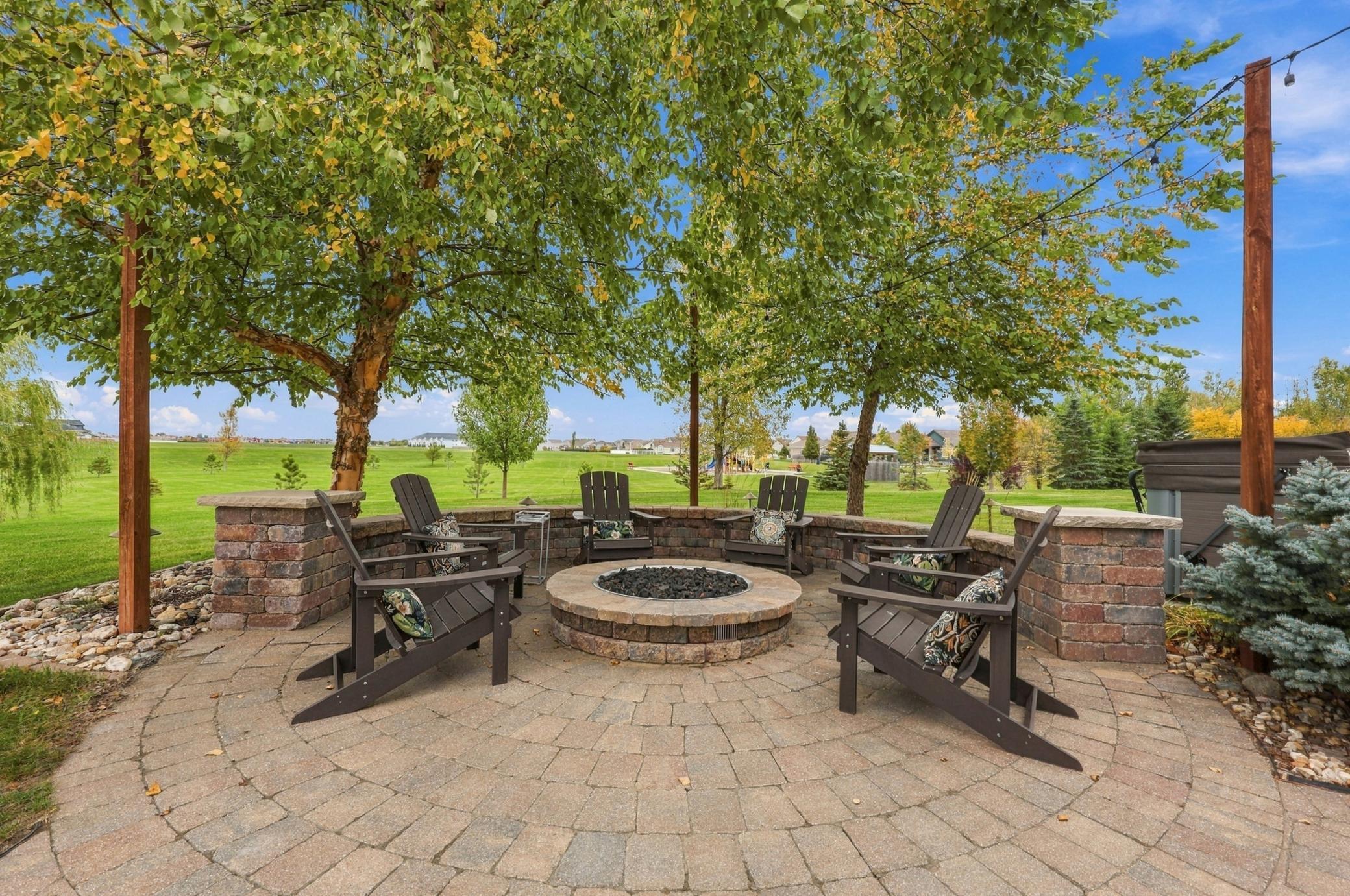 Gas Firepit area - enjoy the view, the outdoor speakers and quick access to the hot tub!