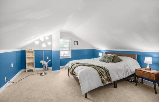The spacious upstairs primary offers a cozy retreat with charming angles, soft natural light, and plenty of room to unwind at the end of the day.