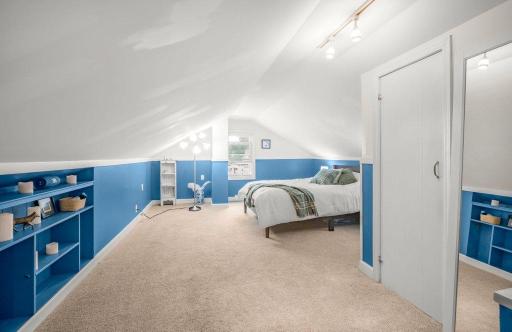 Retreat upstairs to a private primary suite with charming built-ins, generous storage, and plenty of space to relax, recharge, and truly make it your own.