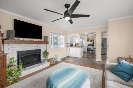 A true bonus in Saint Louis Parkâthe family room addition adds valuable everyday living space, with a cozy fireplace and an easy connection to the kitchen that makes it perfect for relaxing or entertaining.