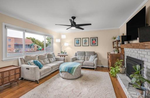 Picture movie night hereâthe fireplace glowing, everyone piled onto the couches, and plenty of room to settle in for a favorite film or game night together.