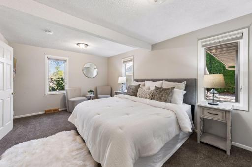 Main level primary bedroom with walk-in closet