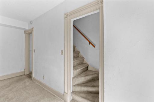 Stairway from main level dining area to upper level