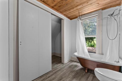 Second duplex upper level full bath with walk in closet