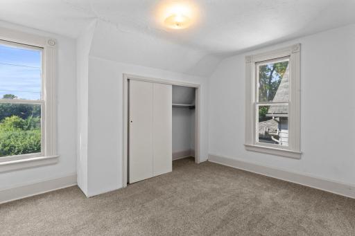 Upper level primary bedroom with large closet