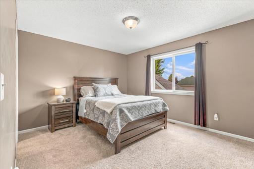 Owners bedroom with walk thru bathroom and walk in closet