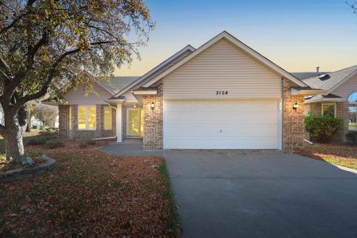 An inviting place to come home to, with the convenience of an attached two-car garage and a covered front entry