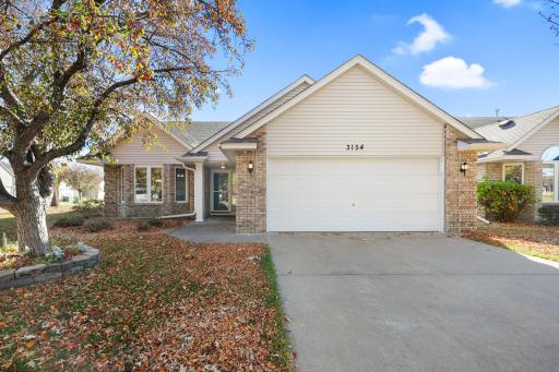 Welcome to Lakes Edge, where the ease of one-level living meets the charm of a lakeside community