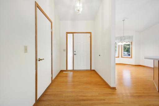 Enjoy the everyday convenience of direct access from the attached garage into the home's welcoming entry